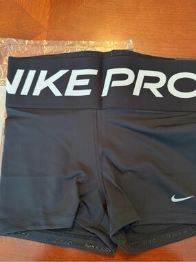 Nike 3” length Black Compression Shorts with White Logo Waistband